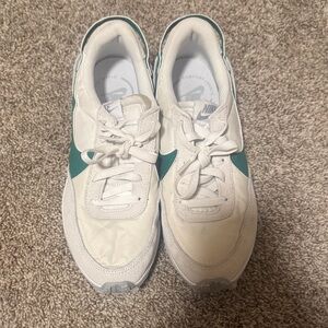 Nike Women’s White Sneakers with Green Swoosh